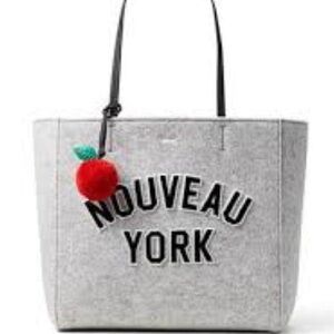 Kate Spade “Nouveau York” Gray Tote with Red Apple Charm